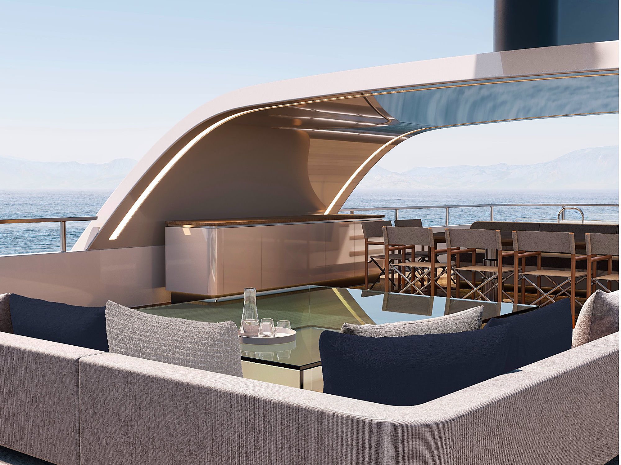 Covered aft deck bar and dining table beneath a sweeping white overhang, with distant coastline visible.